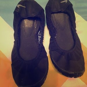 Nike walking shoes , or flats